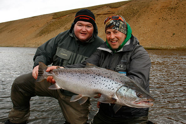 guide and customer pose with a big sea trout at rio gallegous argentina