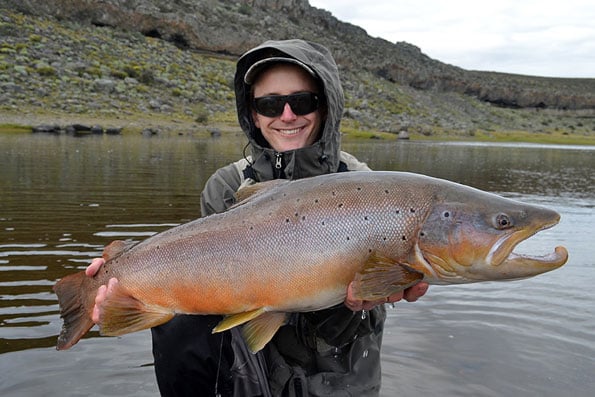 customer holds up a sea trout fly fishing holidays in Argentina Las Buitreras Season Report