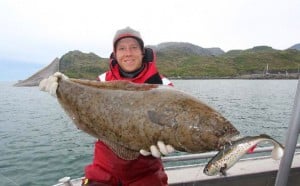 Erik the guide holding a Halibut Fishing report Norway