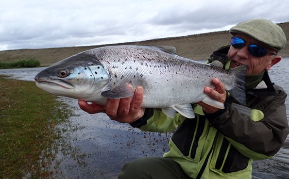 Managing director peter collingsworth holding up a nice sea trout in argentina