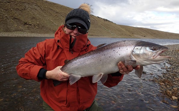 tracey buckenham looking very happy with her sea trout in argentina