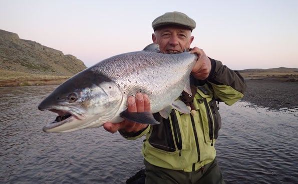 peter collingsworth with a fresh chrome sea trout in argentina