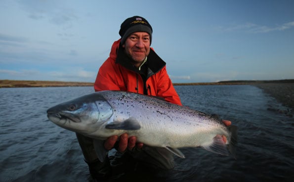 kevin with a big sea trout late at night