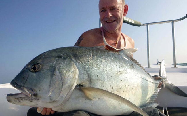 One happy angler with a GT Fishing Report Sri Lanka