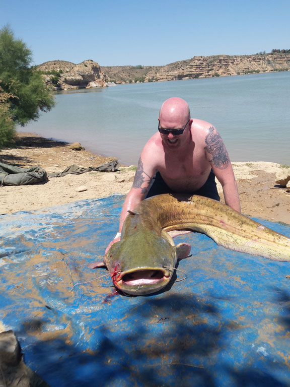 Man with his biggest catfish Spain Fishing Report Ebro