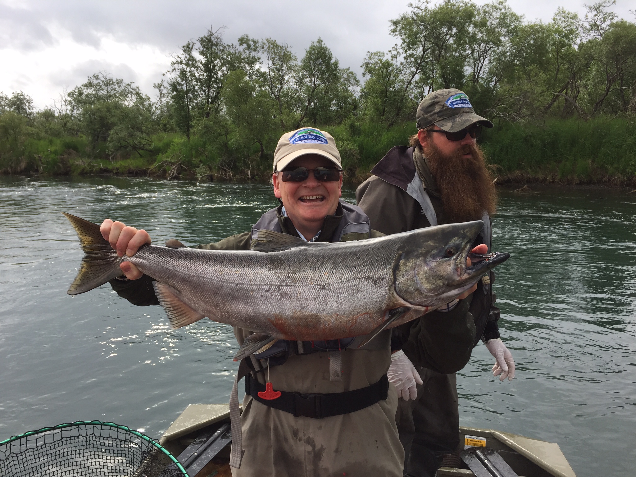 customer holding up a King / Chinook Salmon
