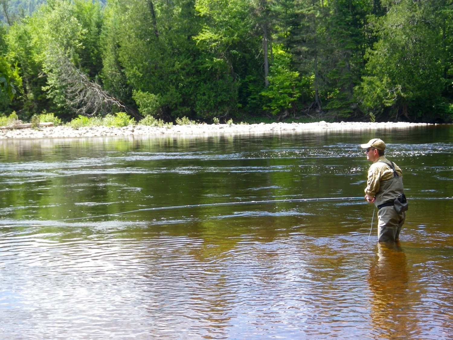 Stunning river fly fishing for Atlantic Salmon in Canada with Salmon Lodge Fishing River Report Sportquest Holidays