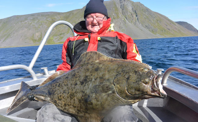 A very happy customer in our Norway Fishing Report