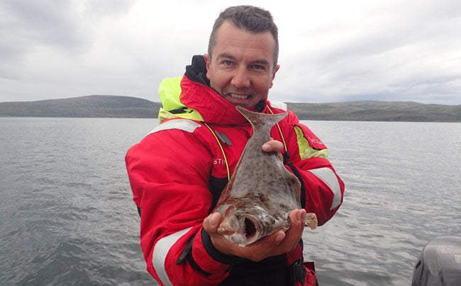 Tiny Halibut caught from havoysund Fishing Report Norway