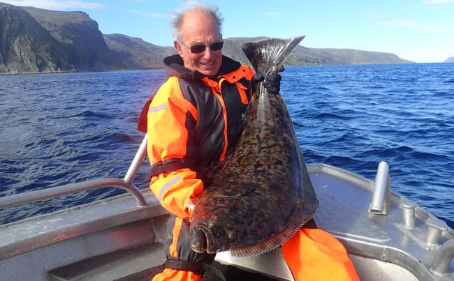 Yet another happy angler from our Norway Fishing Report bags another Halibut
