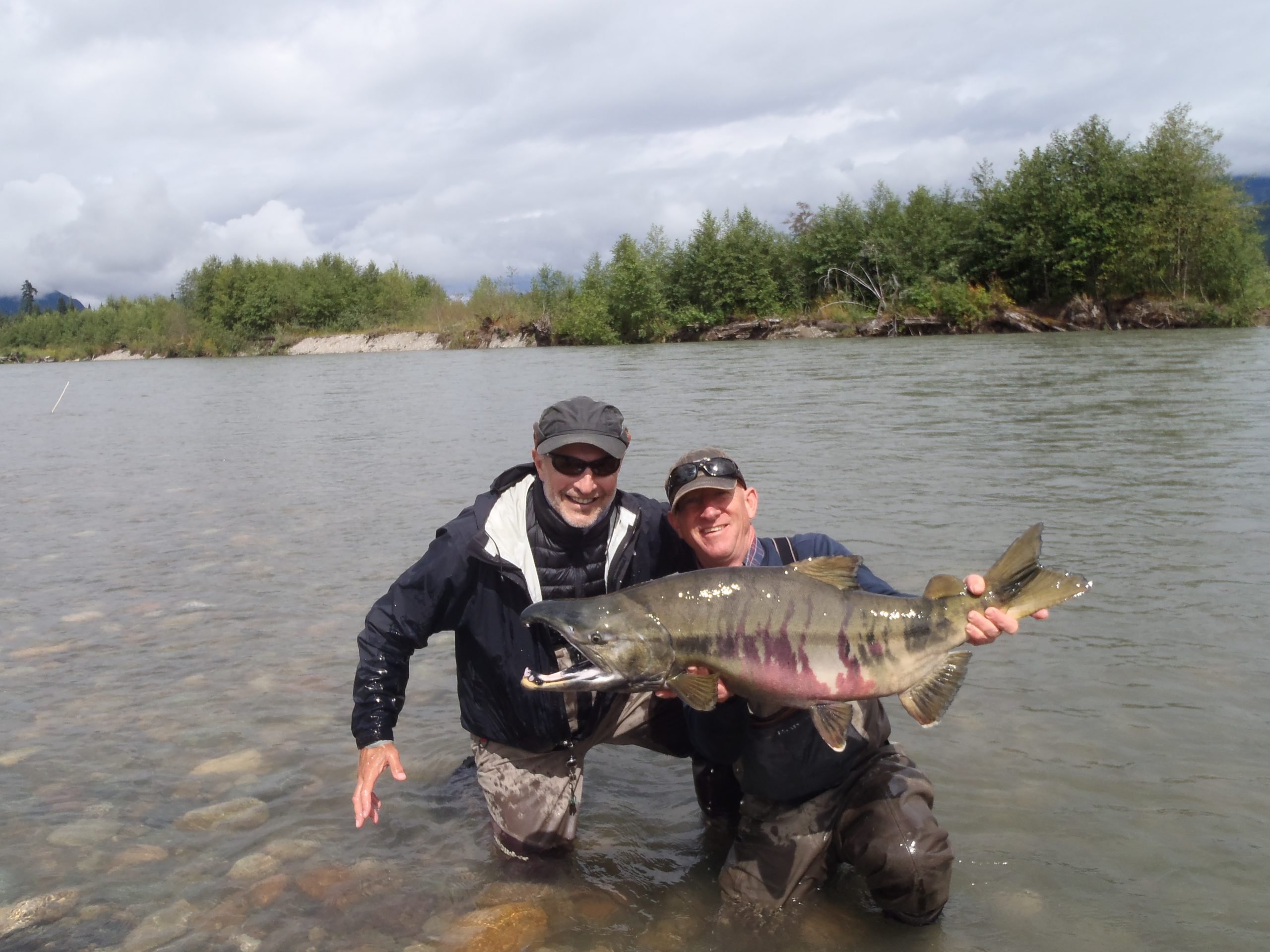 Steelhead John and owner / head guide Andrew with a big fat Chum salmon, fly fishing Canada