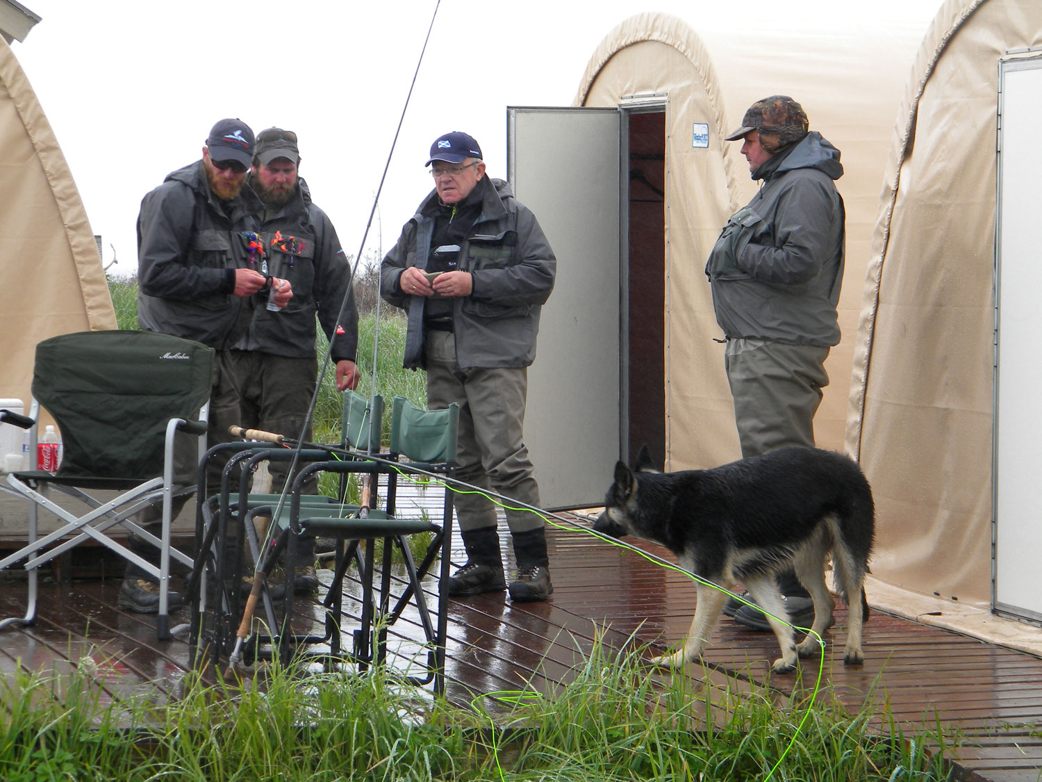 Customers dressed in layered clothing, not everyone wearing Simms jackets, in our view the best wading jackets in the world