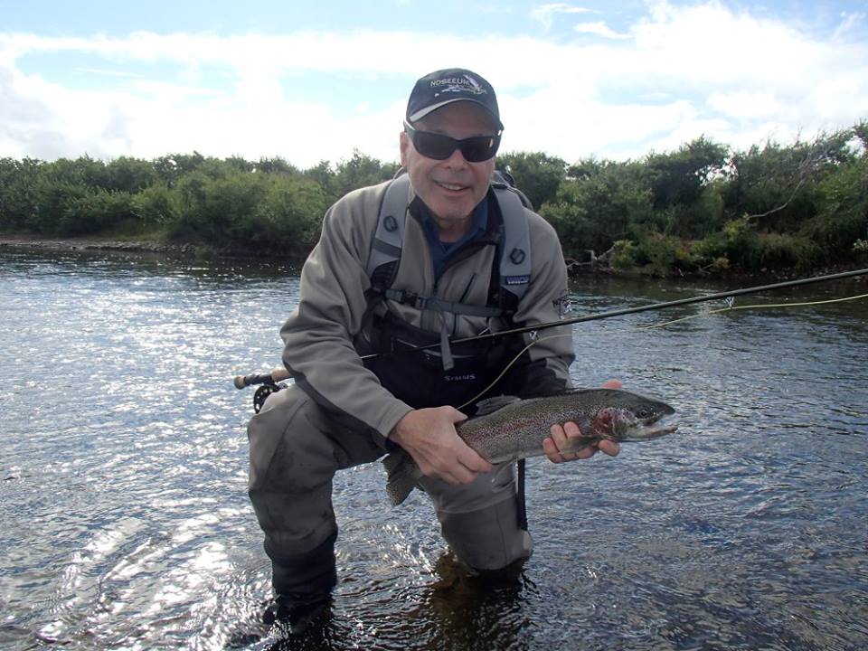 Happy customer Rainbow Trout fishing no see um lodge Alaska