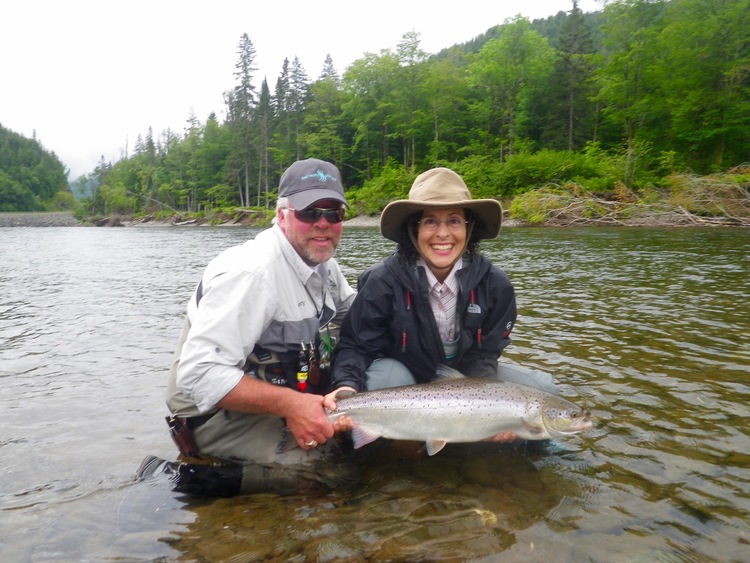 Salmon Sisters Mary Vandusen with Salmon Lodge guide Larry D on the Grand Cascapedia, Nice one Mary!