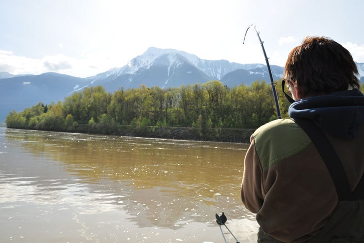 Canada Fishing Report of men playing sturgeon