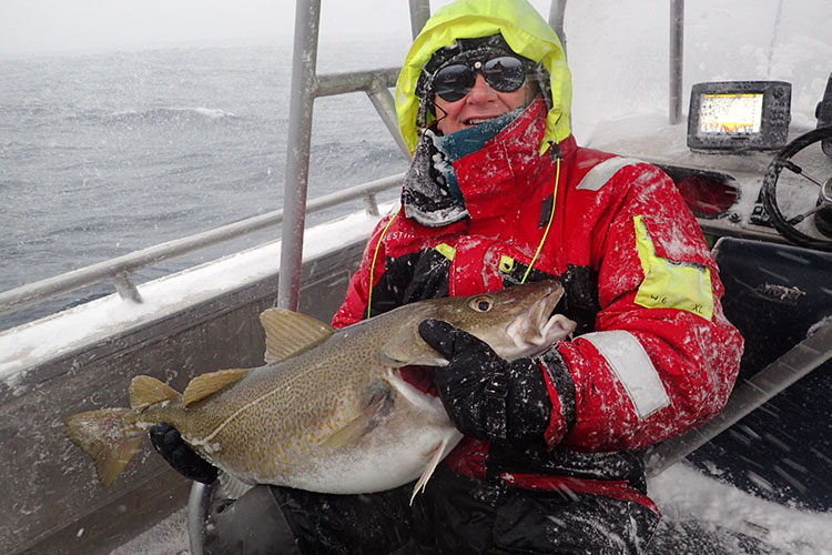 An angler with his Cod