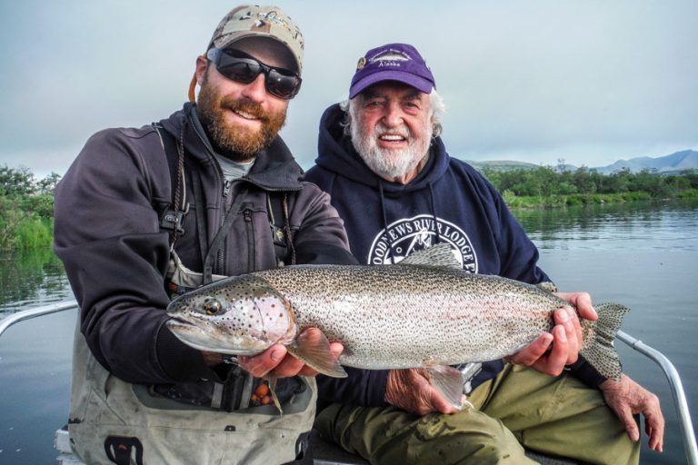 Gtwo customers pose with a big chinook salmon