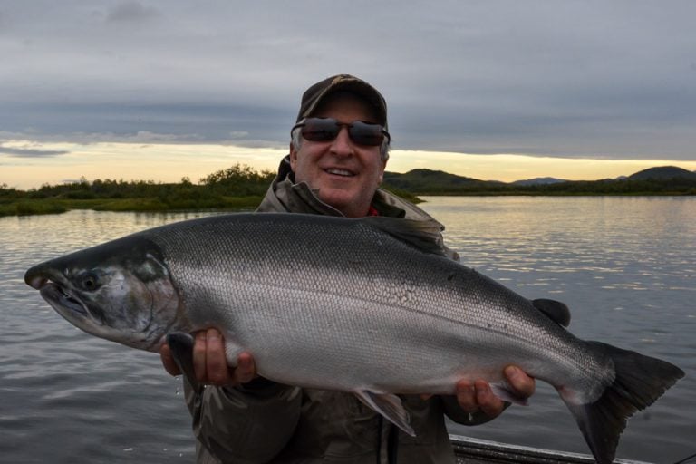 Customers looking happy with a fat fresh silver salmon