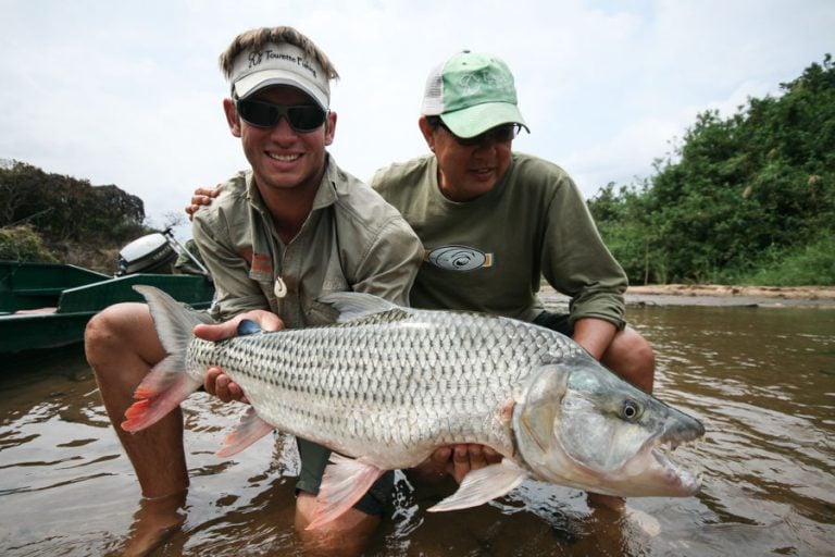 Two anglers Fly Fishing for Goliath Tigerfish