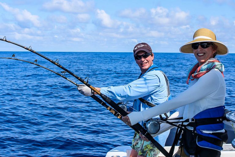 couple enjoying game fishing