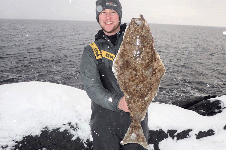 Happy angler with his catch