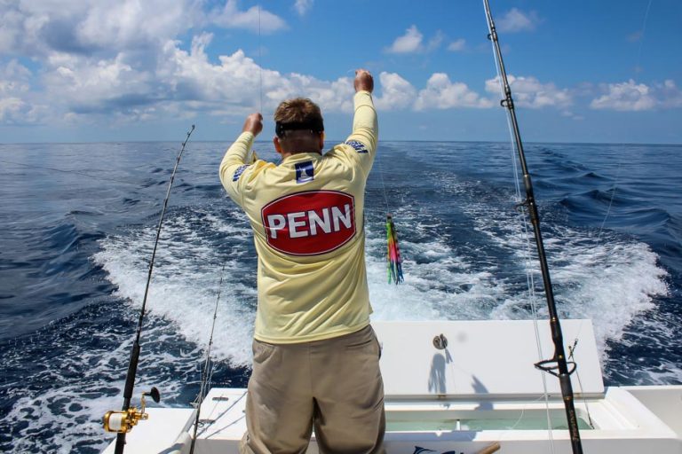 deck hand helping with the rods