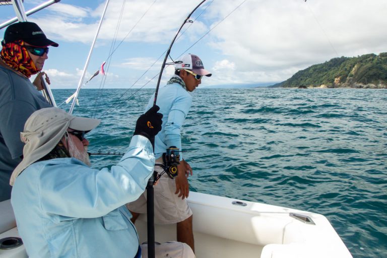 john playing his rooster fish