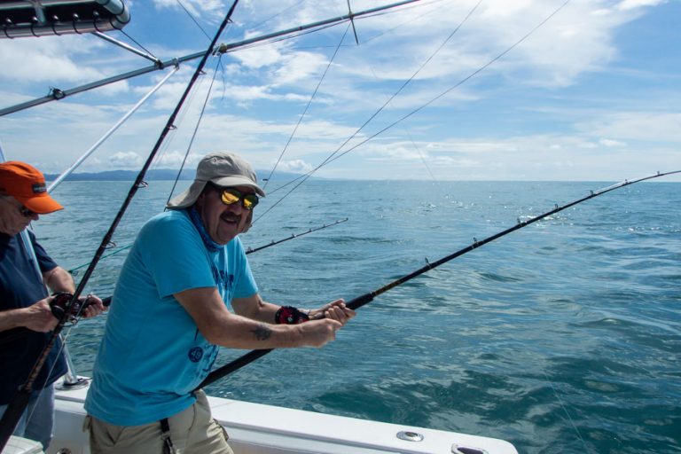 angler bent in to fish