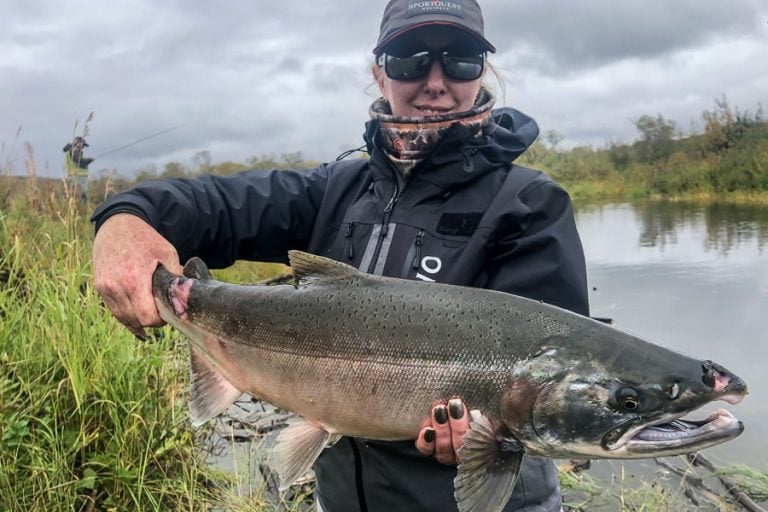 lady angler with huge salmon