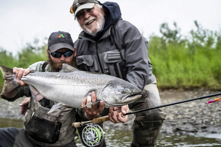 Cracking picture of customer and guide with a very very nice Chinook salmon