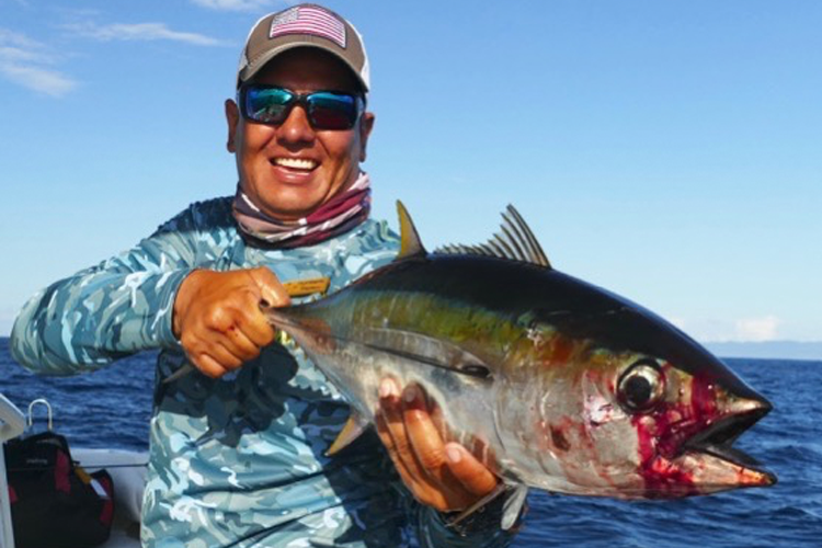 Angler with small Tuna