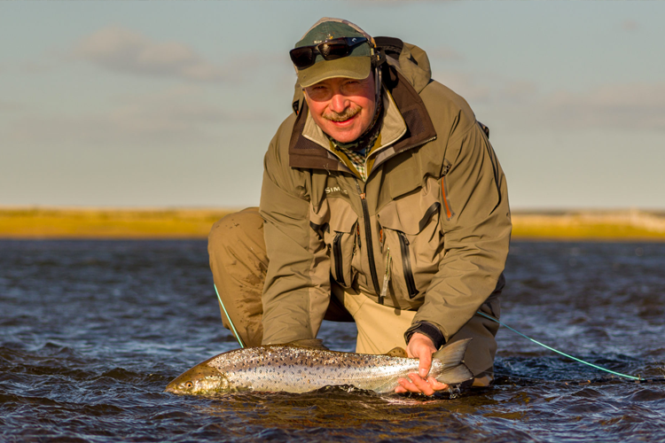 Angler with a nice sea trout