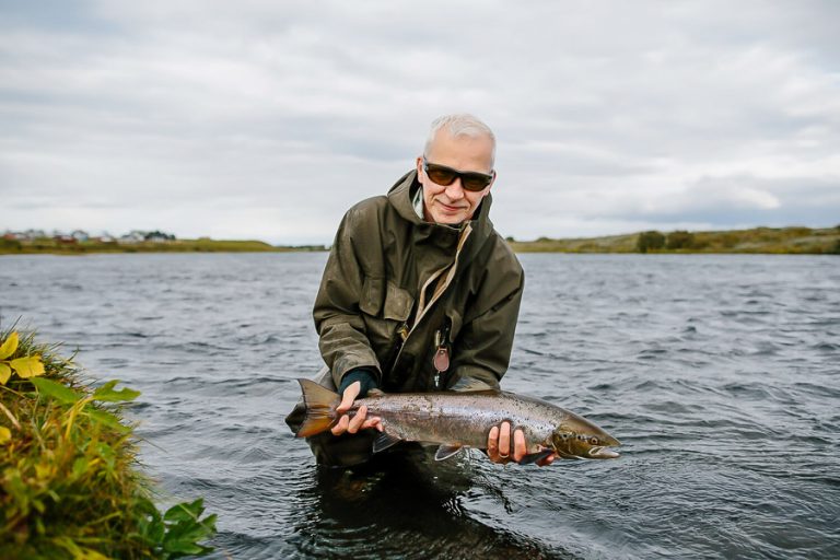 Customer retuning a fish of around 10lbs to the west ranga river in iceland